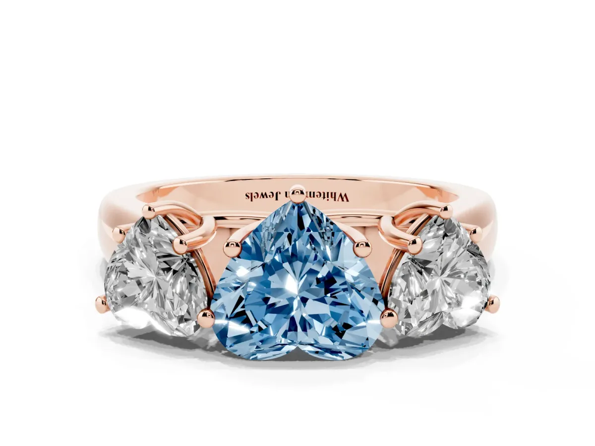 Fancy Blue Heart Cut Three-Stone Diamond Ring with Prong Setting on a Classic Band Rose gold