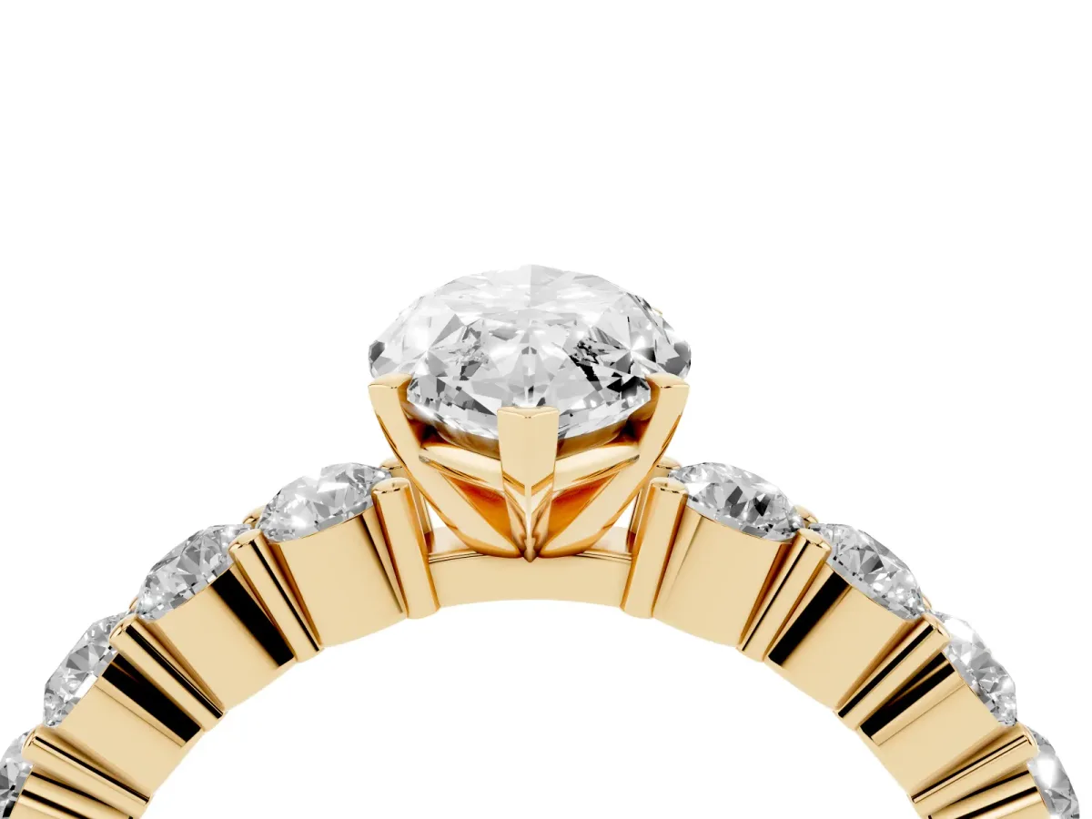 Marquise Cut Diamond Solitaire Ring with Shared Prong Round Side Stones Yellow gold