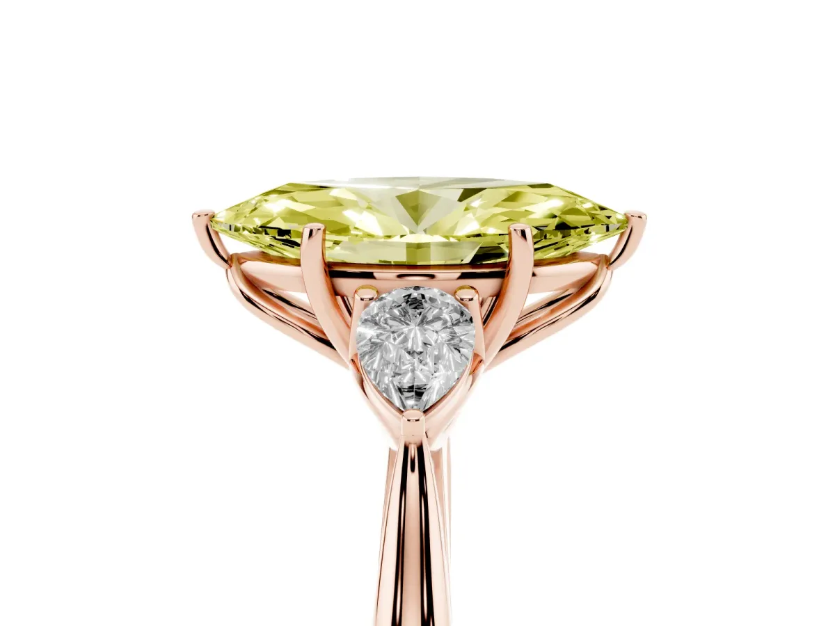 Fancy Yellow Three-Stone Marquise Cut Diamond Ring with Pear Side Stones in Four-Prong Setting Rose gold
