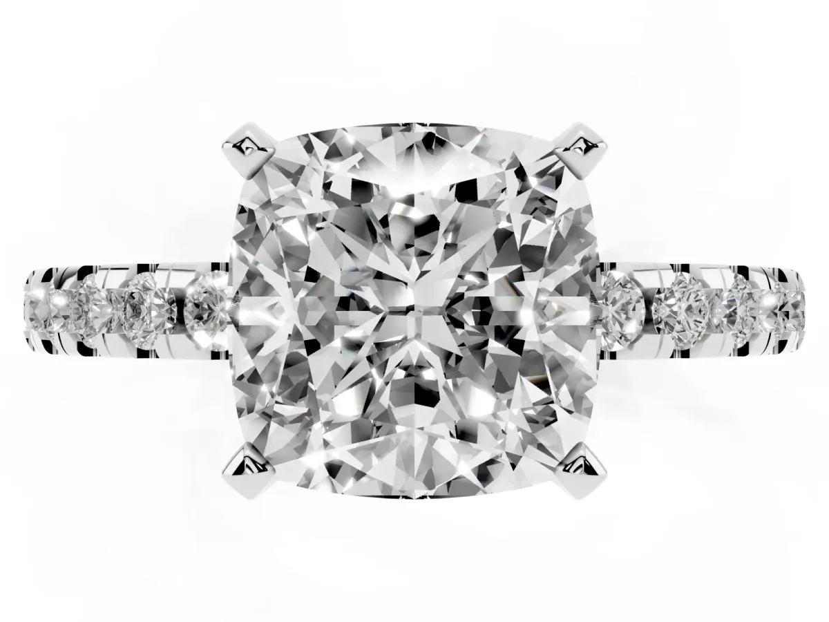 Cushion Cut Diamond Solitaire Ring with Round Pavé Band and Four-Prong Setting Silver