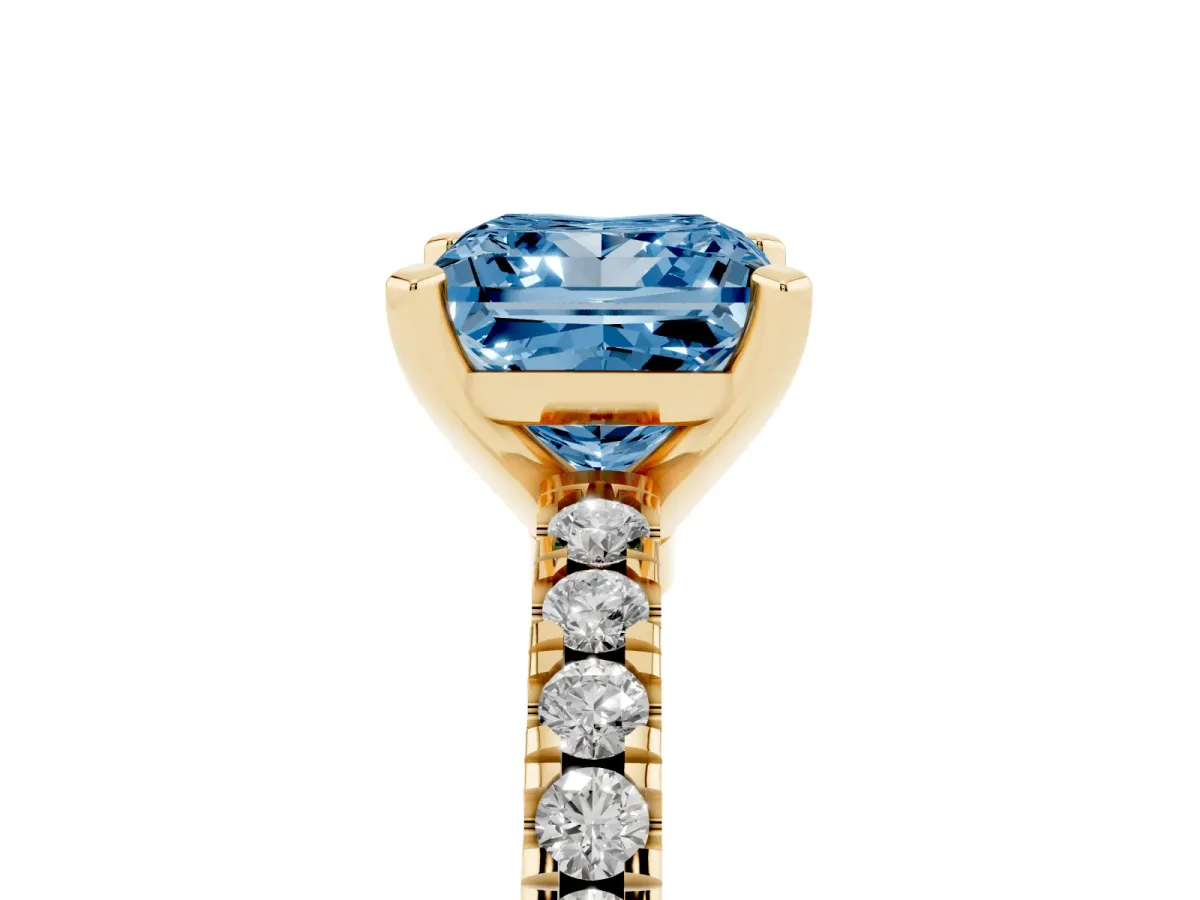 Fancy Blue Princess Cut Solitaire Diamond with Pavé Band and Four-Prong Setting Yellow gold