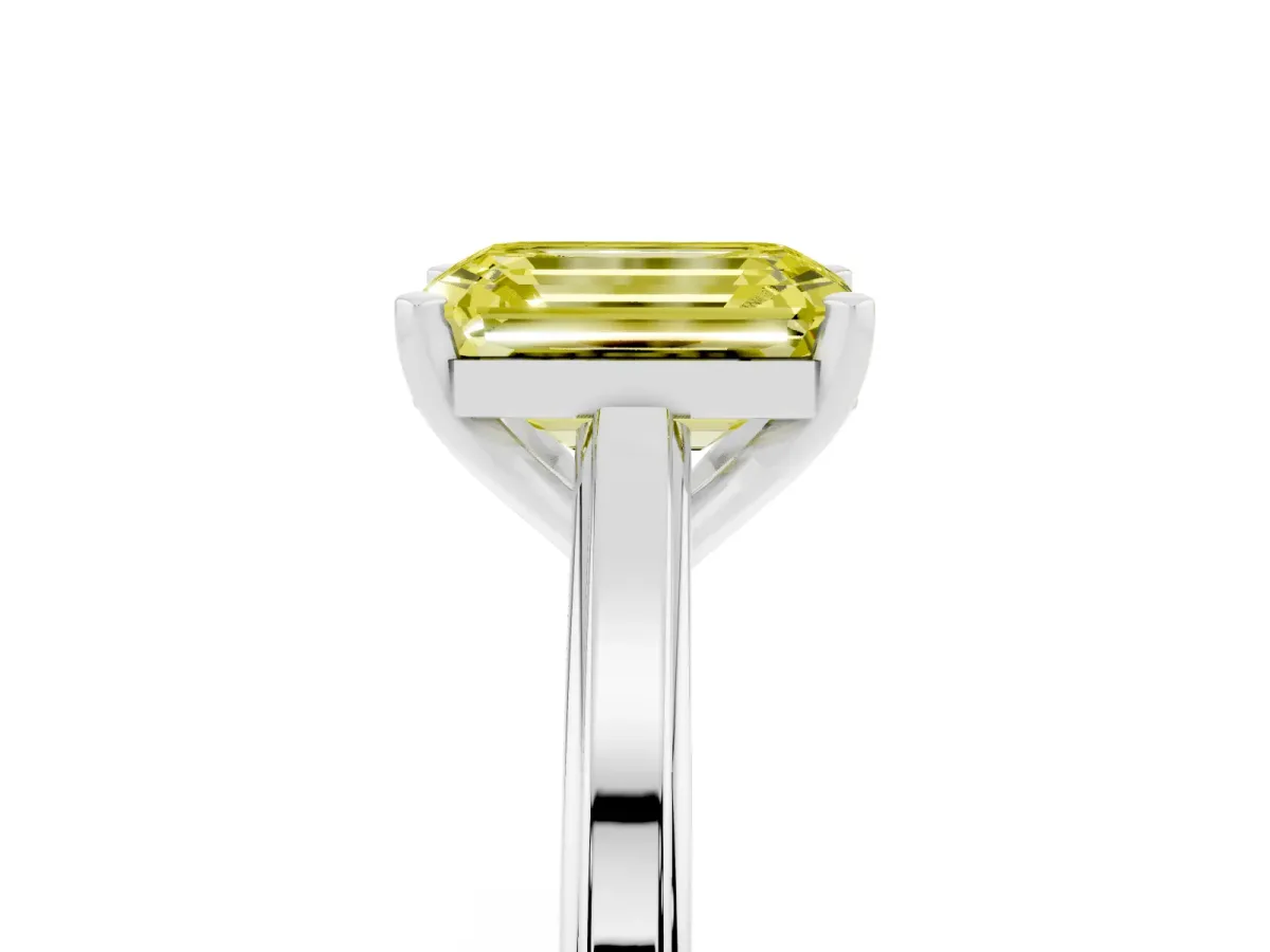 Fancy Yellow Emerald Cut Solitaire Diamond Ring with Four-Prong Setting and Classic Band Silver