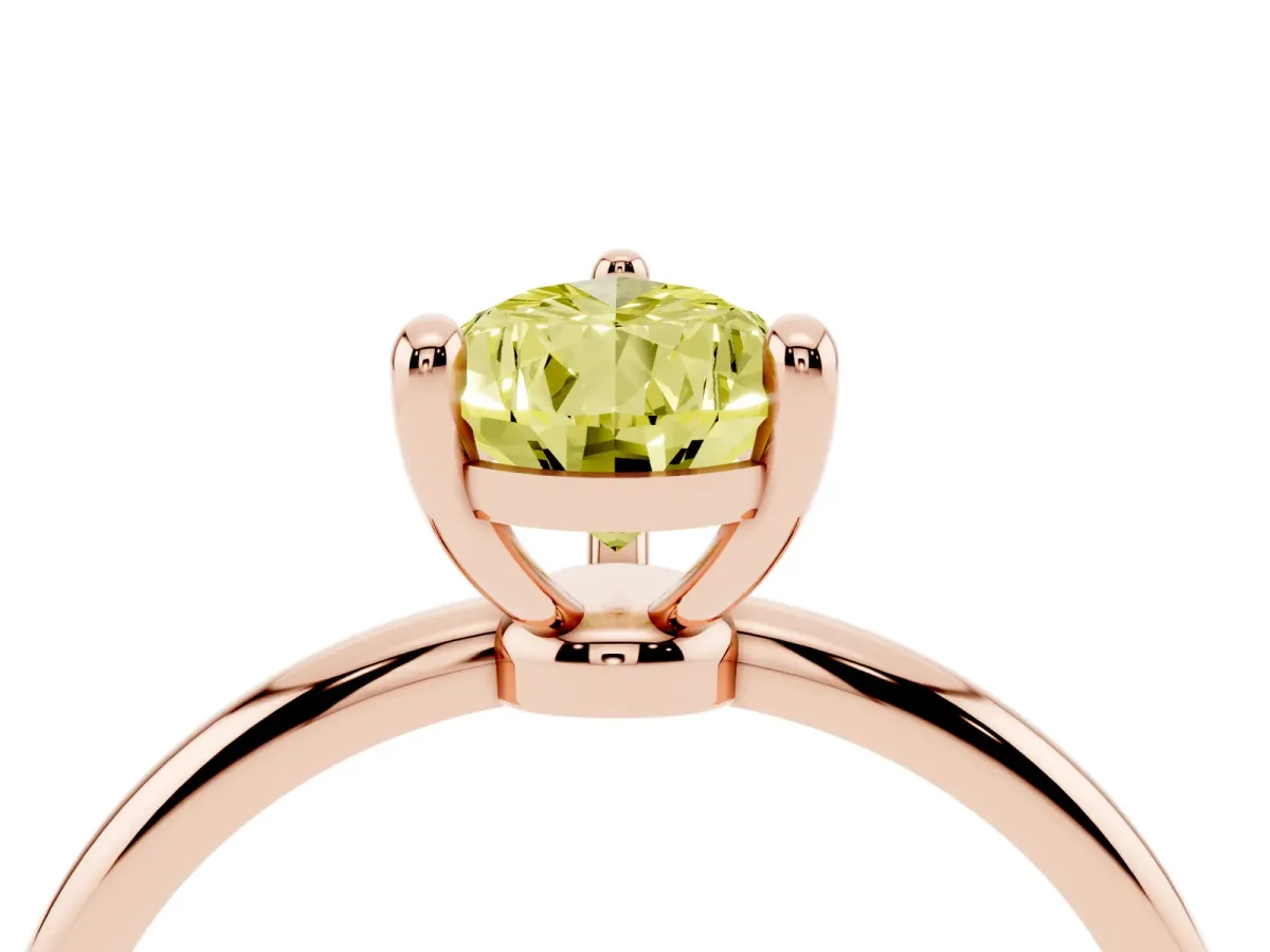 Fancy Yellow Pear Cut Solitaire Diamond Ring with 4-Prong Setting on a Classic Band Rose gold
