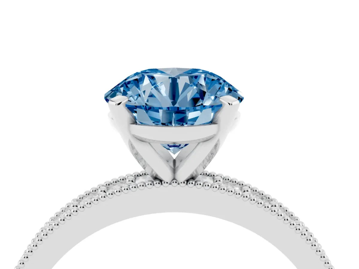 Fancy Blue Round Cut Diamond Milgrain Pavé Engagement Ring with Four-Prong Setting Silver