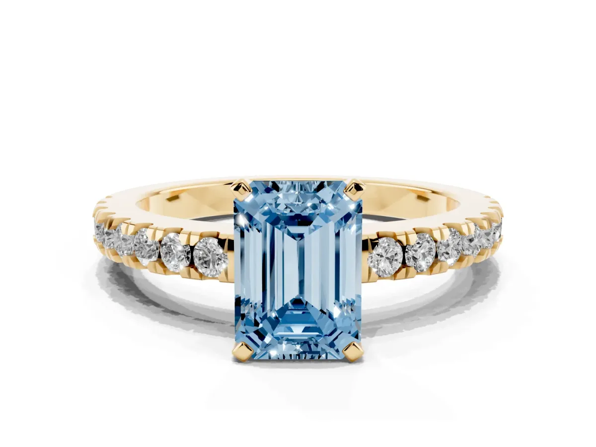 Fancy Blue Emerald Cut Solitaire Diamond with Pavé Band and Four-Prong Setting Yellow gold