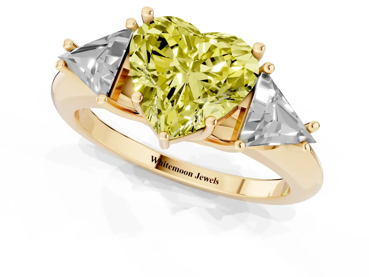 Fancy Yellow Three-Stone Heart Cut Diamond Engagement Ring with Trillion Side Stones and Prong Setting Yellow gold