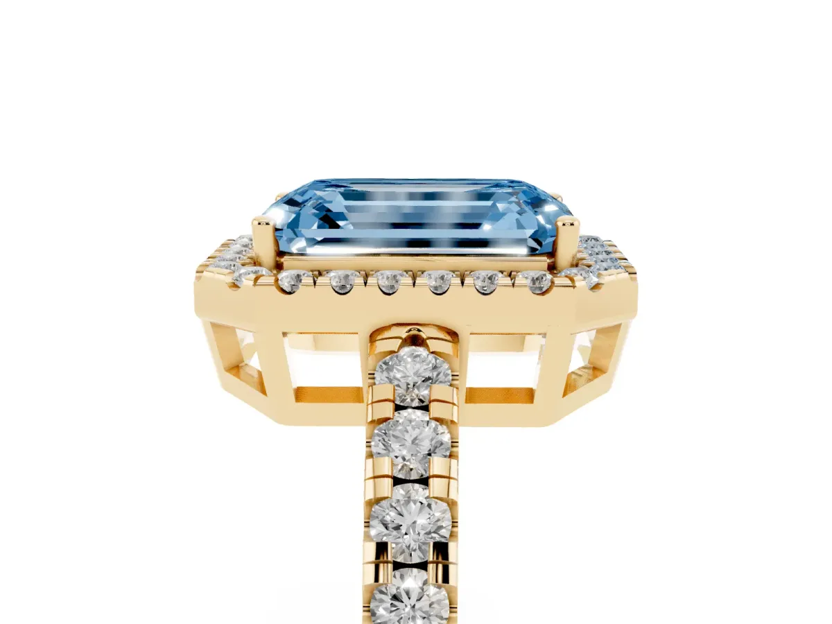 Fancy Blue Emerald Cut Diamond Halo Ring with Pavé Band and Four-Prong Setting Yellow gold