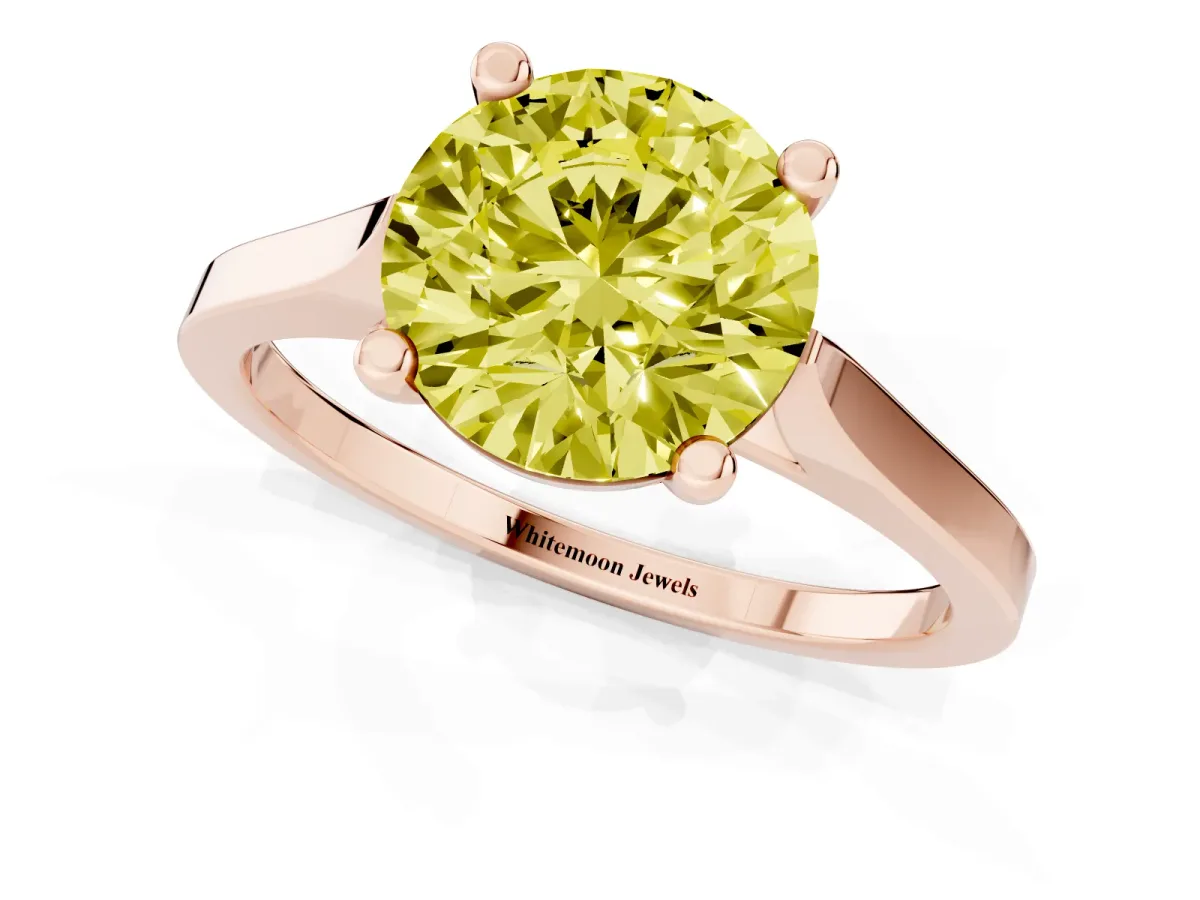 Fancy Yellow Round Cut Solitaire Diamond Ring with Four-Prong Setting and Tapered Band Rose gold