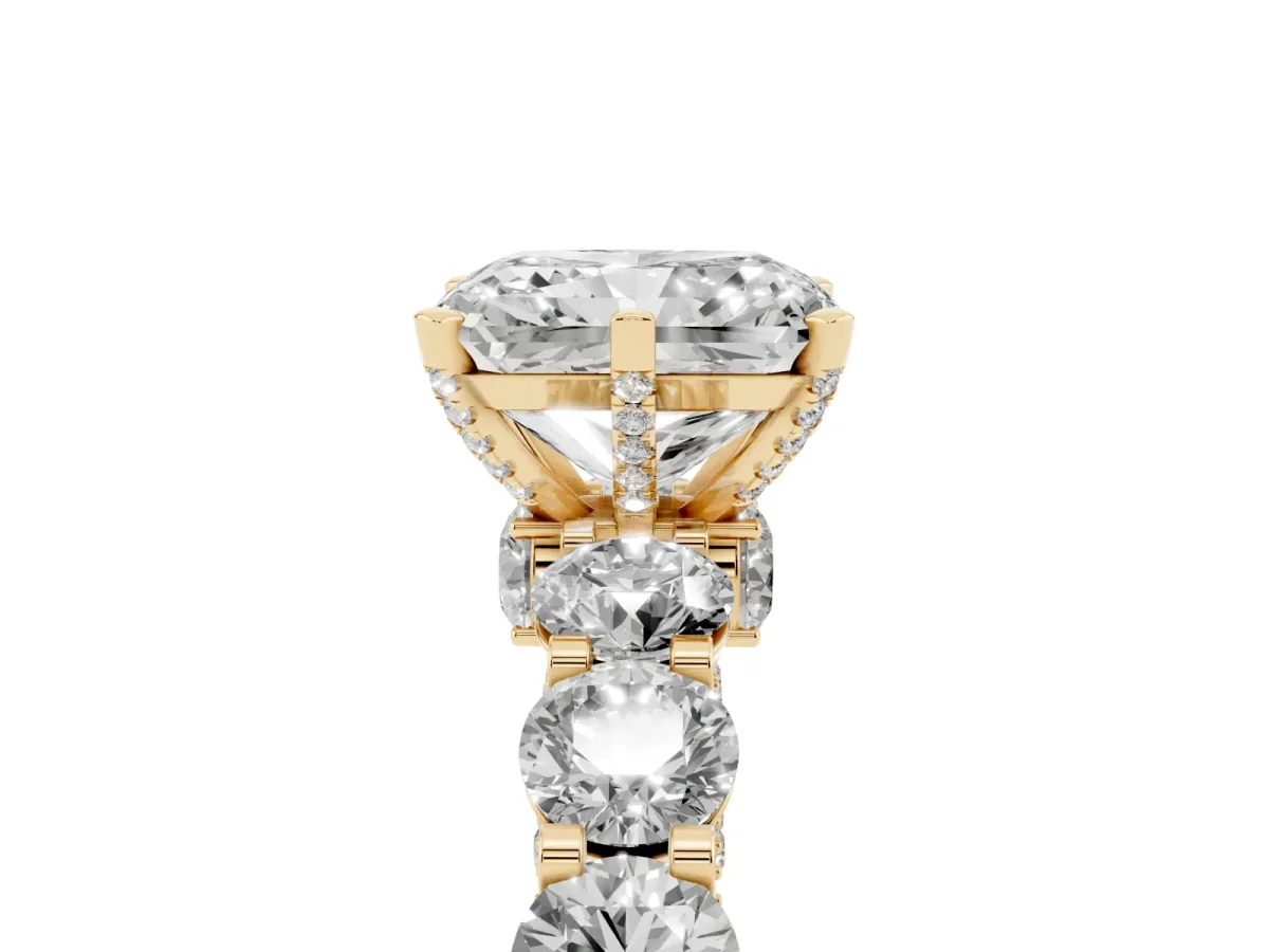 Radiant Cut Diamond Side Stone Engagement Ring with Four-Prong Setting Yellow gold