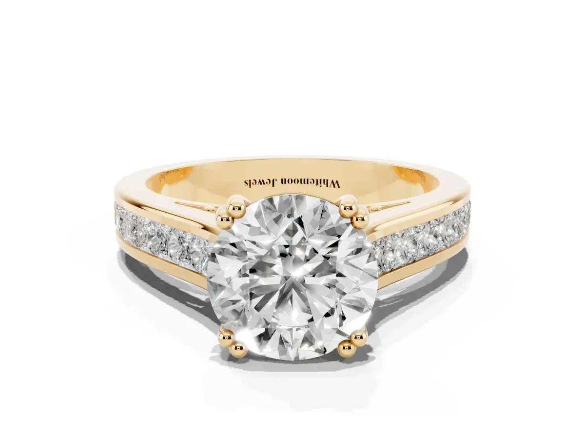 Round Cut Cut Channel Set Solitaire Engagement Ring with Prong Setting Yellow gold