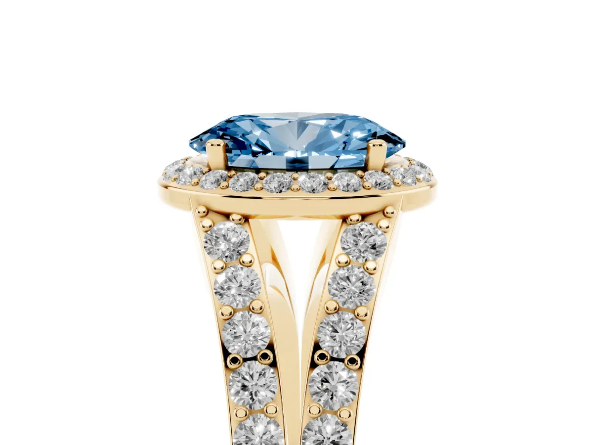 Fancy Blue Oval Cut Diamond Split Shank Halo Ring with Four-Prong Setting Yellow gold