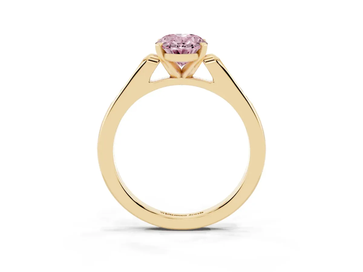 Fancy Pink Oval Cut Diamond Solitaire Ring with Channel Set Round Band and Prong Setting Yellow gold