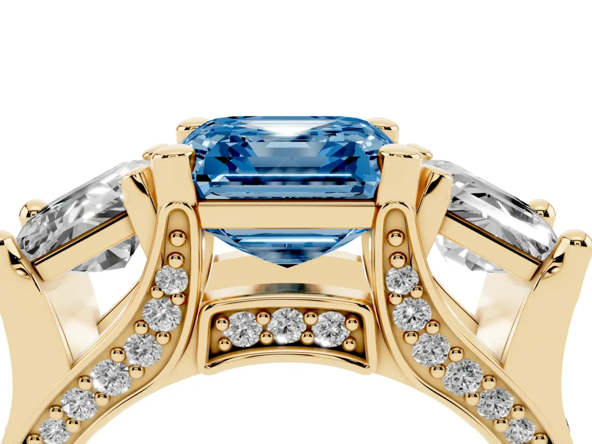 Fancy Blue Asscher Cut Diamond Three-Stone Ring with Channel Set Band and Four-Prong Setting Yellow gold