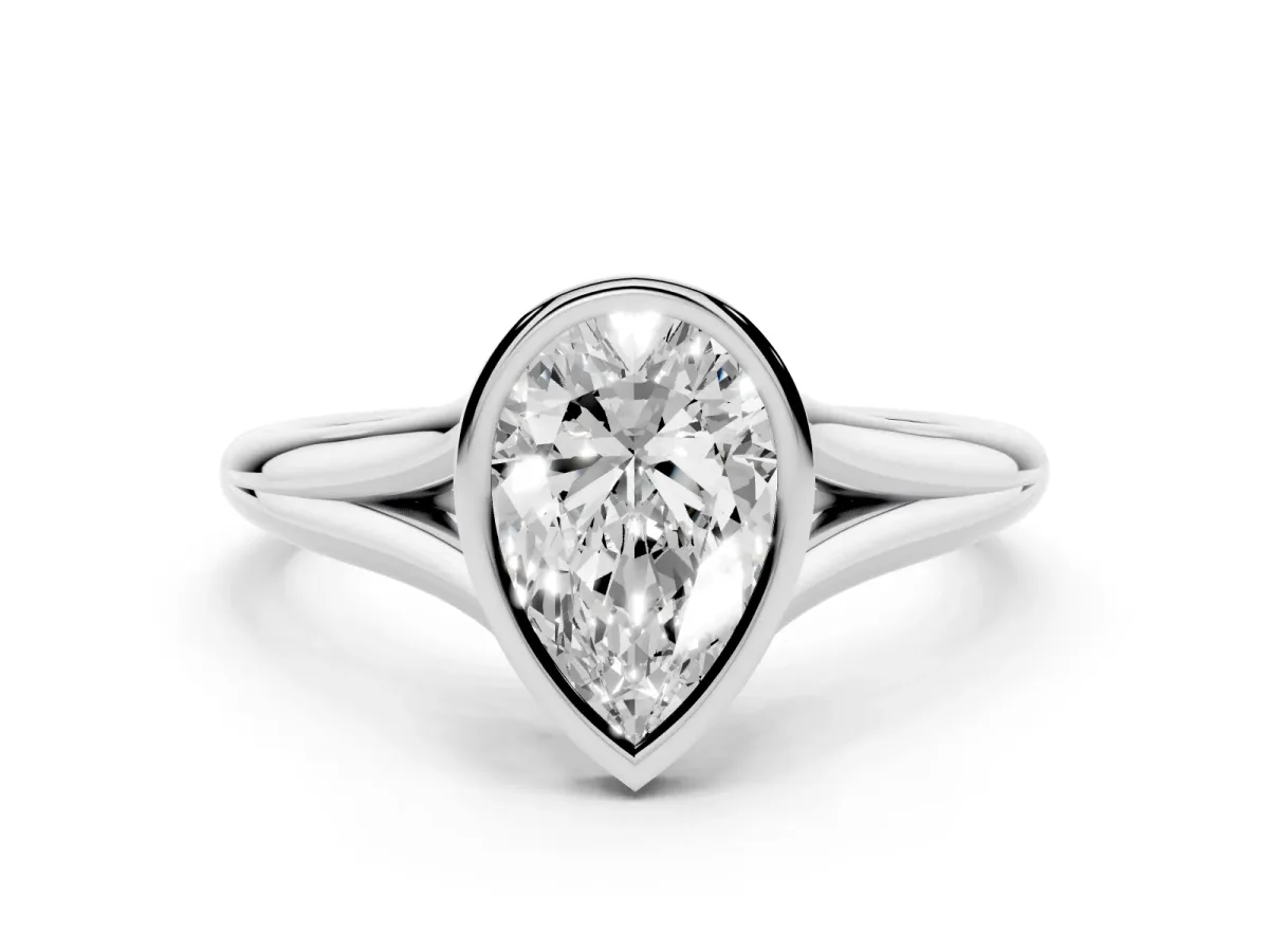 Bezel Set Pear Cut Cut Solitaire Ring with Tapered Band Platinum