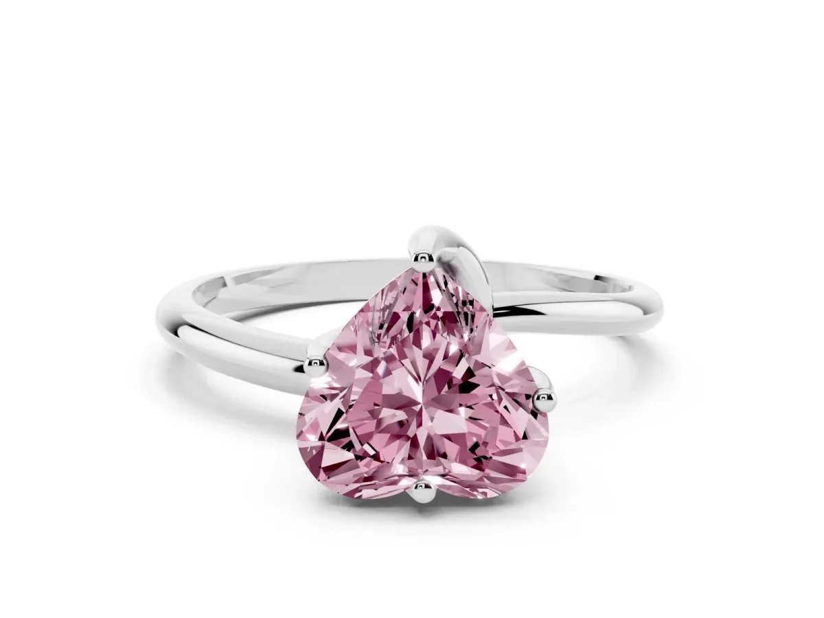 Fancy Pink Heart Cut Diamond Solitaire Engagement Ring with Four-Prong Setting and Classic Band Silver