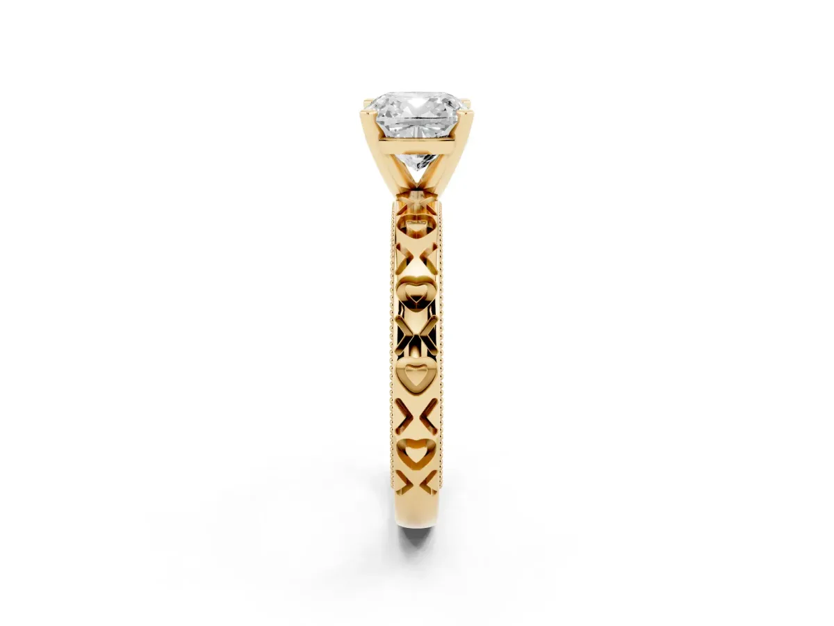 Cushion Cut Solitaire Diamond Engagement Ring with XO Engraved Band and Four-Prong Setting Yellow gold