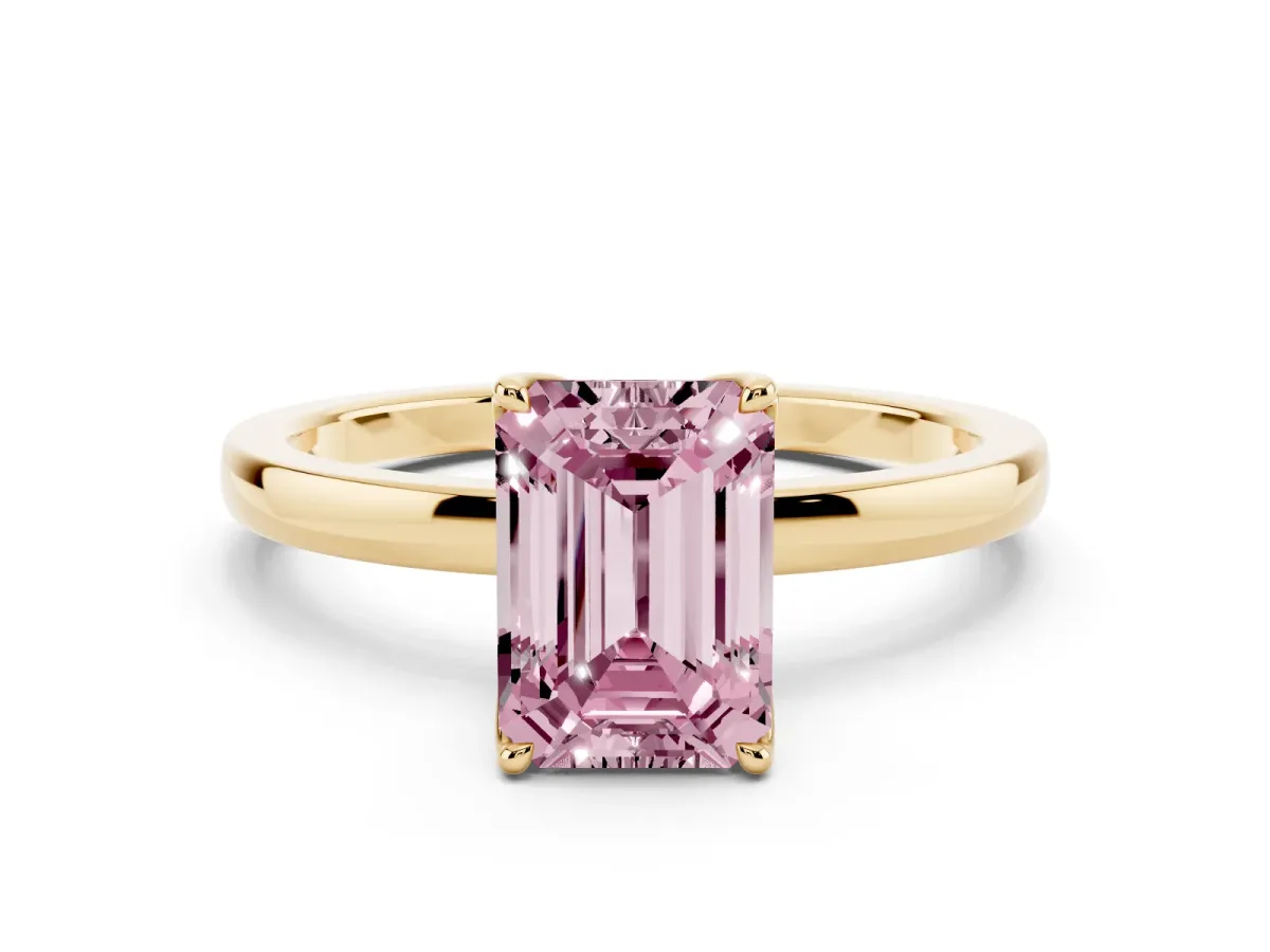 Fancy Pink Emerald Cut Diamond Solitaire Ring with Thin Band and Prong Setting Yellow gold