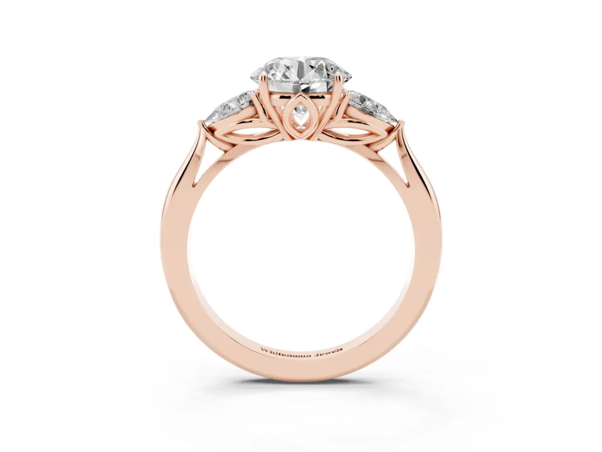 Round Cut Diamond Three-Stone Ring with Pear Side Stones and Prong Setting Rose gold