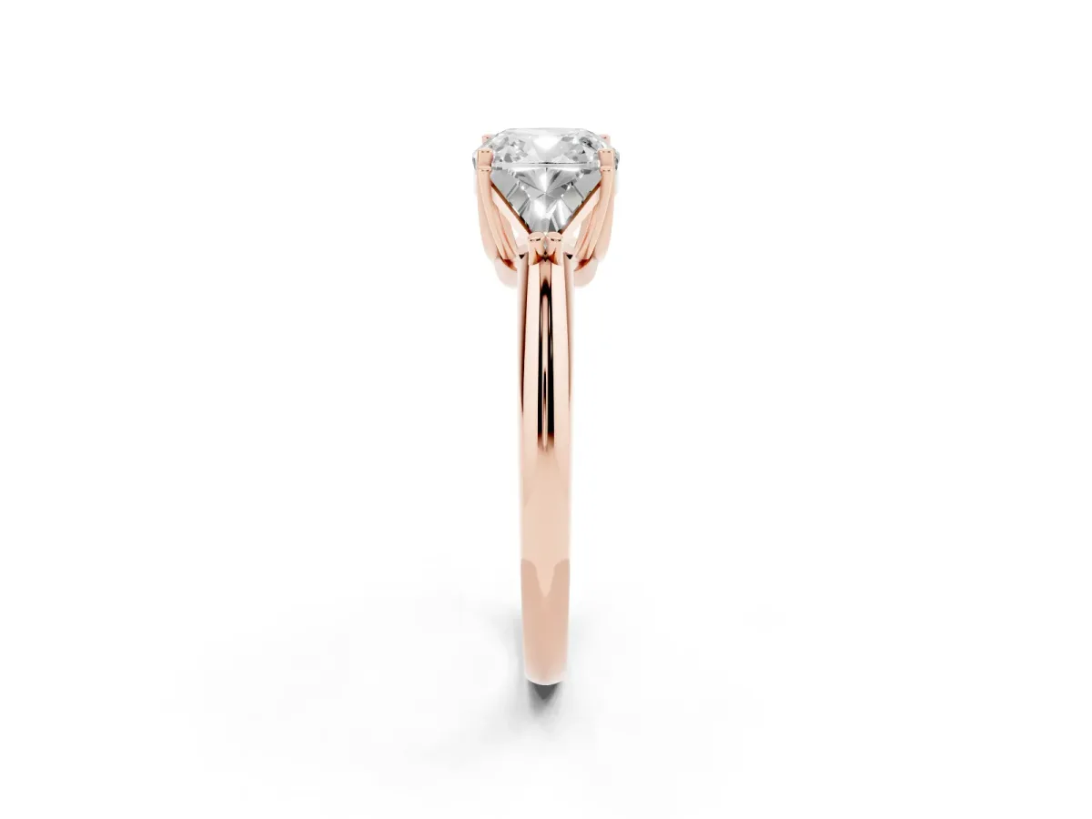 Three-Stone Cushion Cut Diamond Engagement Ring with Trillion Side Stones and Prong Setting Rose gold