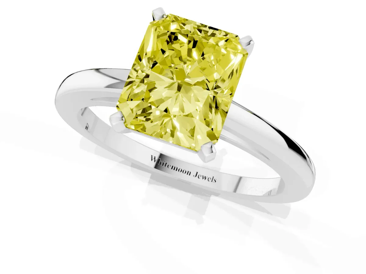 Fancy Yellow Radiant Cut Solitaire Diamond Engagement Ring with Four-Prong Setting on a Classic Band White gold