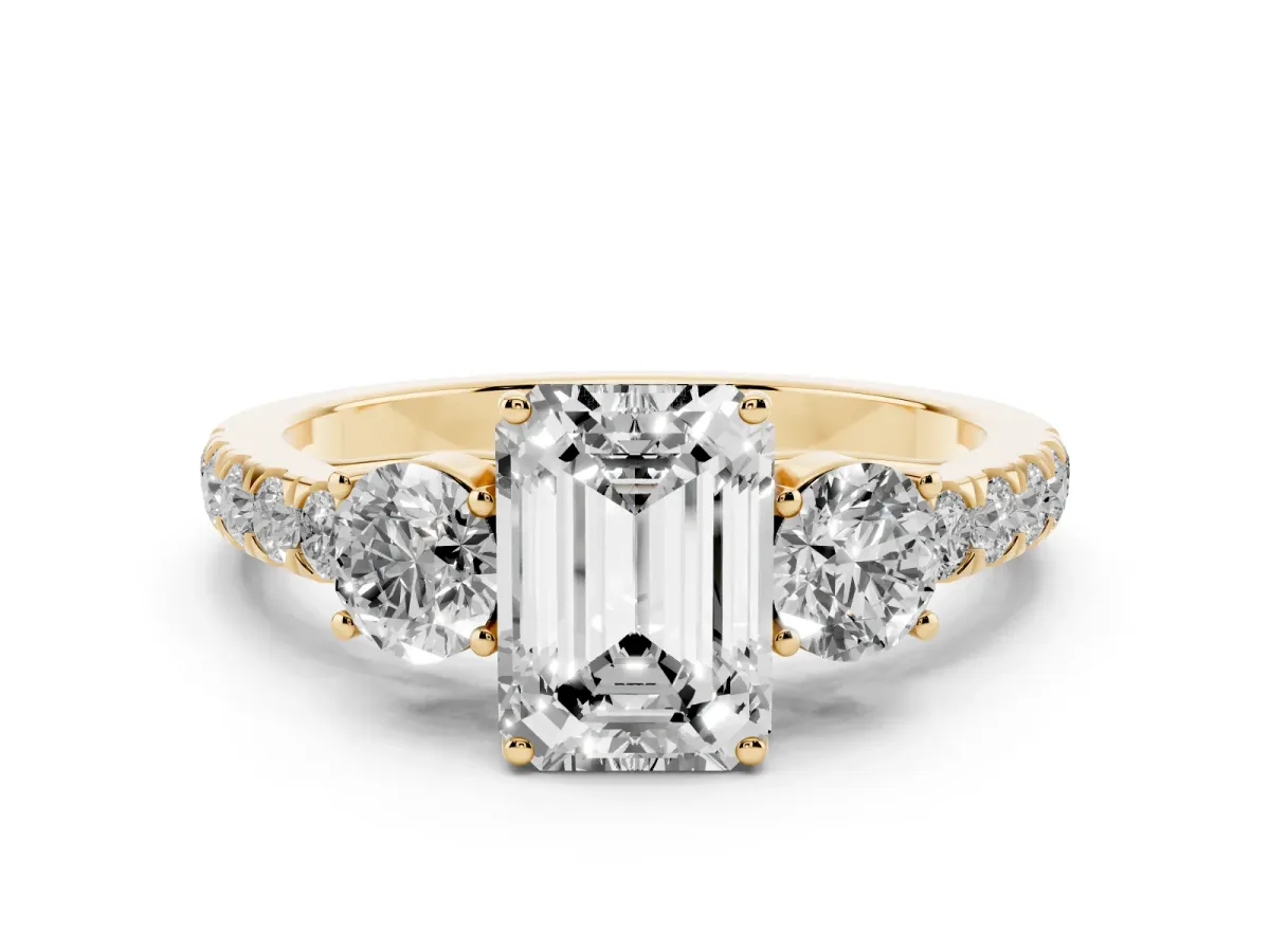 Emerald Cut Cut Diamond Three-Stone Ring with Round Side Stones and Pavé Band Yellow gold