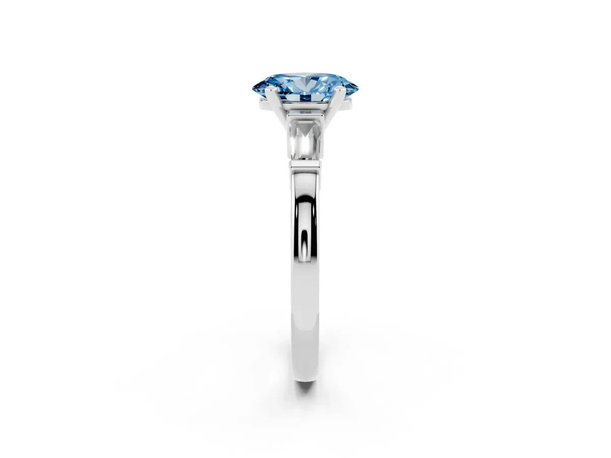 Fancy Blue Oval Cut Cut Diamond Solitaire Ring with Tapered Baguette Accents and Four-Prong Setting White gold