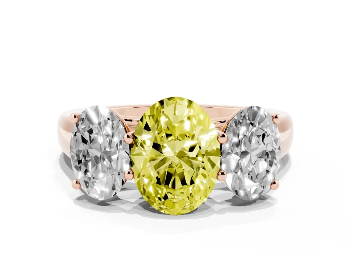 Fancy Yellow Oval Cut Three-Stone Diamond Ring with Prong Setting on a Classic Band Rose gold