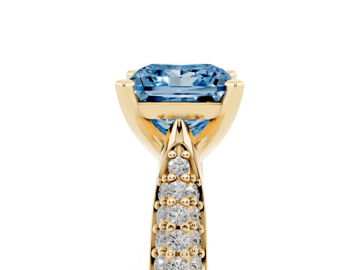Fancy Blue Princess Cut Diamond Solitaire Engagement Ring with Multi-Row Round Pavé Band and Prong Setting Yellow gold