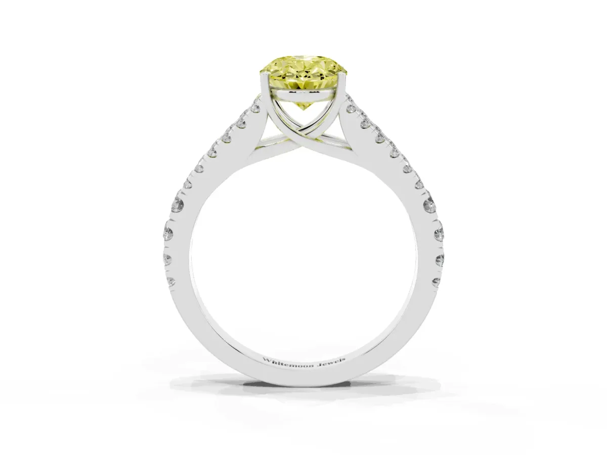 Fancy Yellow Oval Cut Diamond Split Shank Engagement Ring with Round Pavé and Prong Setting Platinum