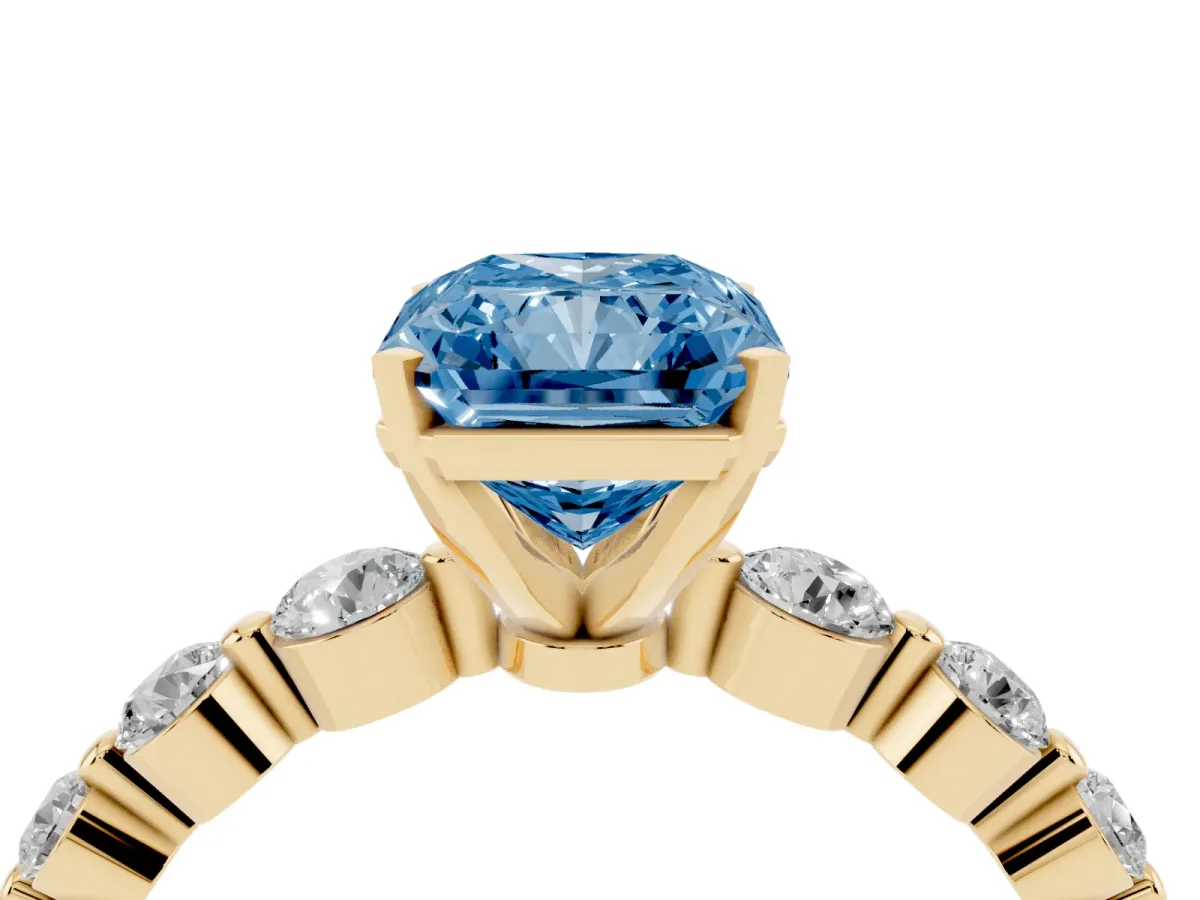 Fancy Blue Radiant Cut Solitaire Diamond Ring with Pave Band and Four-Prong Setting Yellow gold