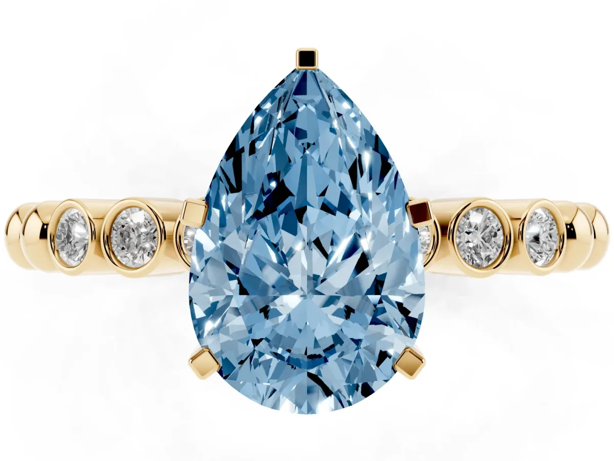 Fancy Blue Pear Cut Solitaire Bezel Accent Diamond Engagement Ring with Beaded Band and Four-Prong Setting Yellow gold