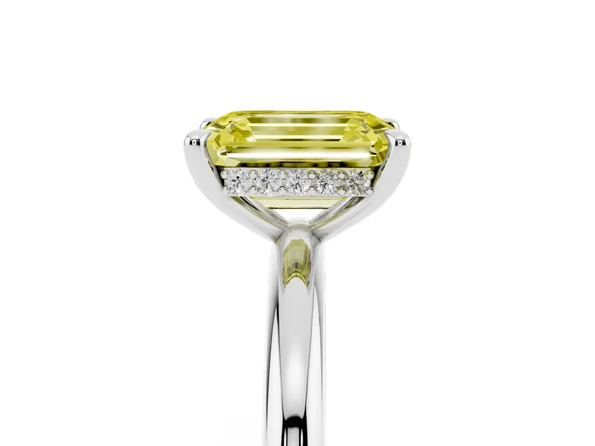 Fancy Yellow Emerald Cut Diamond Solitaire Ring with Thin Band and Four-Prong Setting Silver