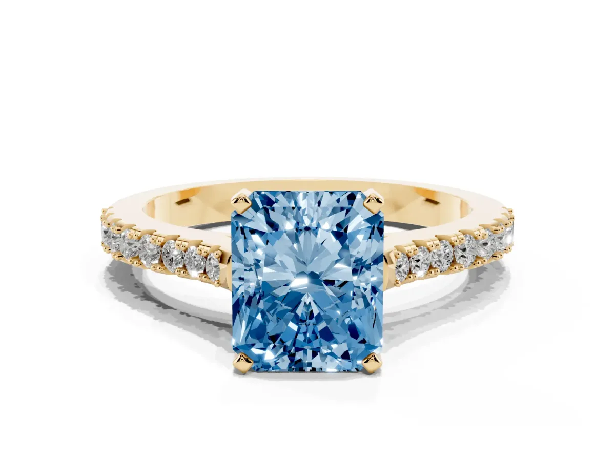 Fancy Blue Radiant Cut Cut Solitaire Diamond Engagement Ring with Pave Band and Four-Prong Setting Yellow gold