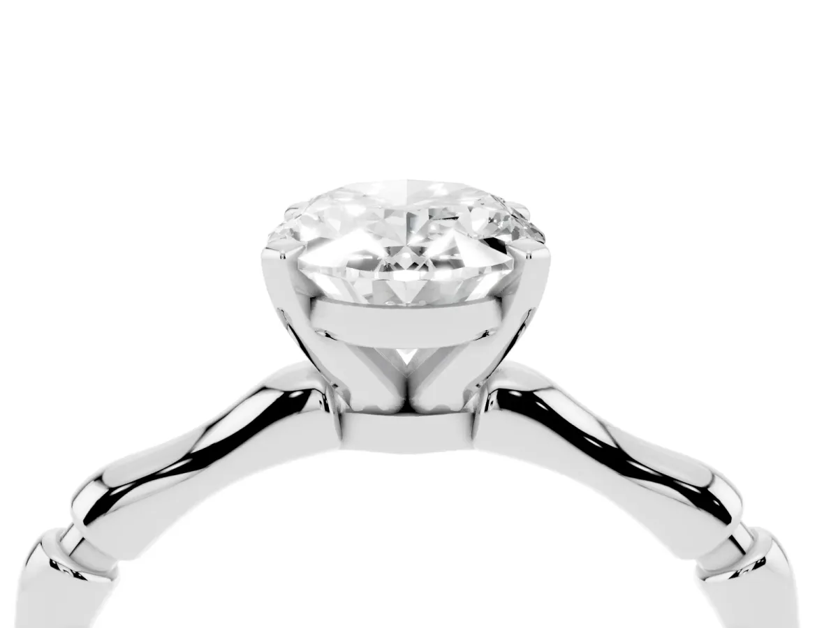 Oval Cut Solitaire Diamond Ring with Bamboo Band and Four-Prong Setting Silver