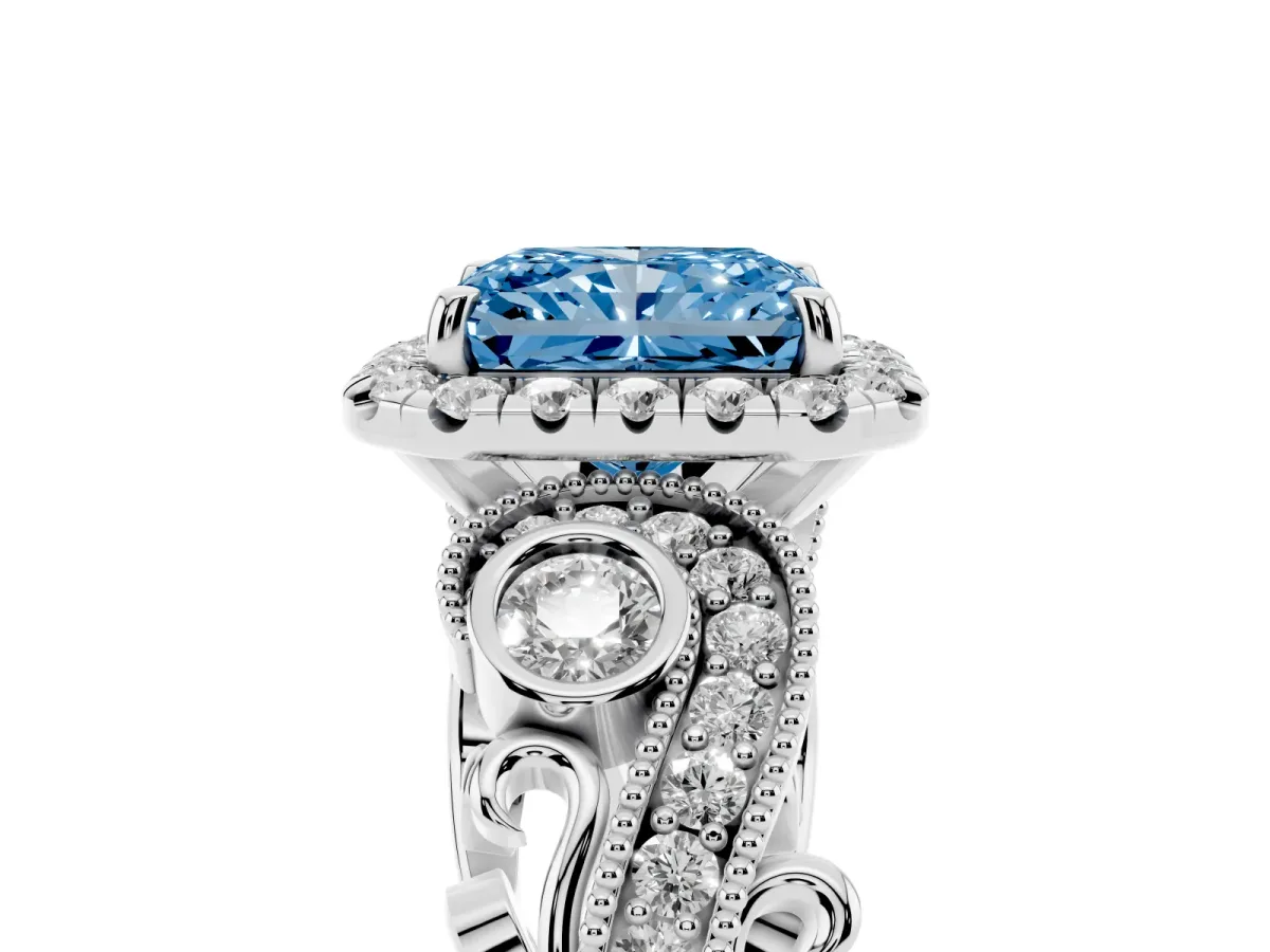 Fancy Blue Radiant Cut Halo Diamond Ring with Milgrain and Bezel Accents on a Split Shank Band Platinum