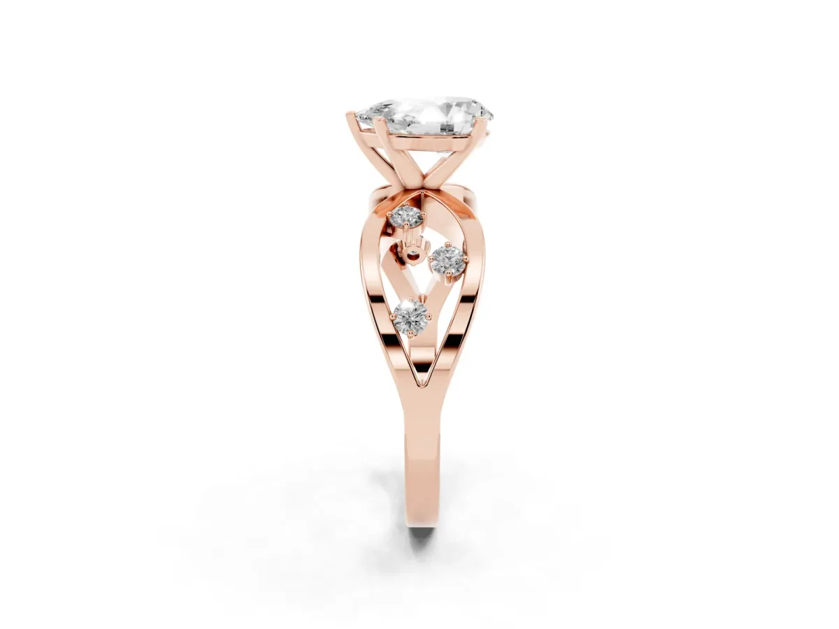 Pear Cut Cut Solitaire Diamond with Side Stones on Criss-Cross Band and Four-Prong Setting Rose gold