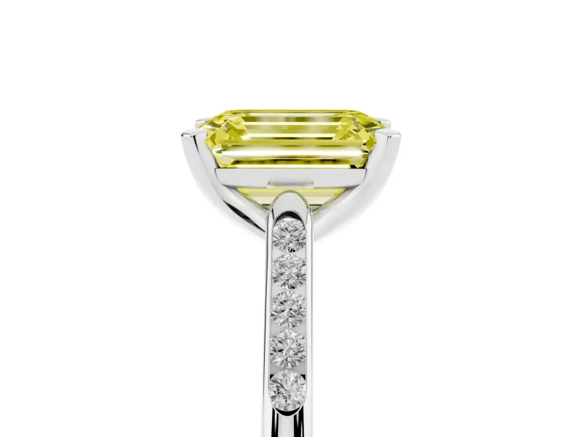 Fancy Yellow Emerald Cut Diamond Solitaire Ring with Channel Set Round Band and Prong Setting Silver