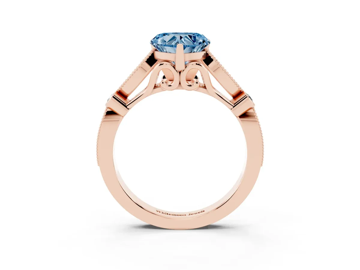 Fancy Blue Heart Cut Cut Diamond with Milgrain Marquise and Bezel Accents on a Solitaire Band with Prong Setting Rose gold