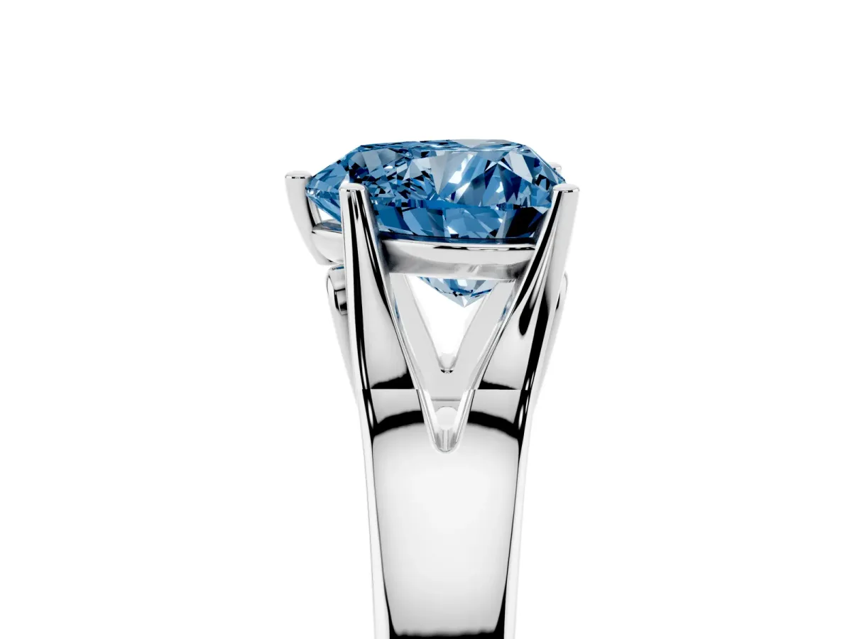 Fancy Blue Heart Cut Solitaire Diamond Ring with Cathedral Band and Four-Prong Setting Silver