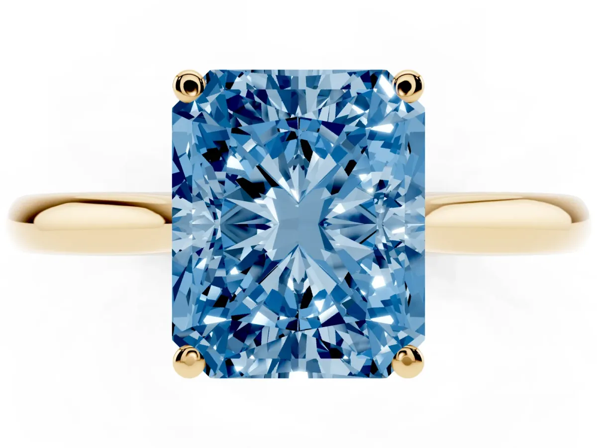 Fancy Blue Radiant Cut Cut Solitaire Ring with Cathedral Band and Four-Prong Setting Yellow gold