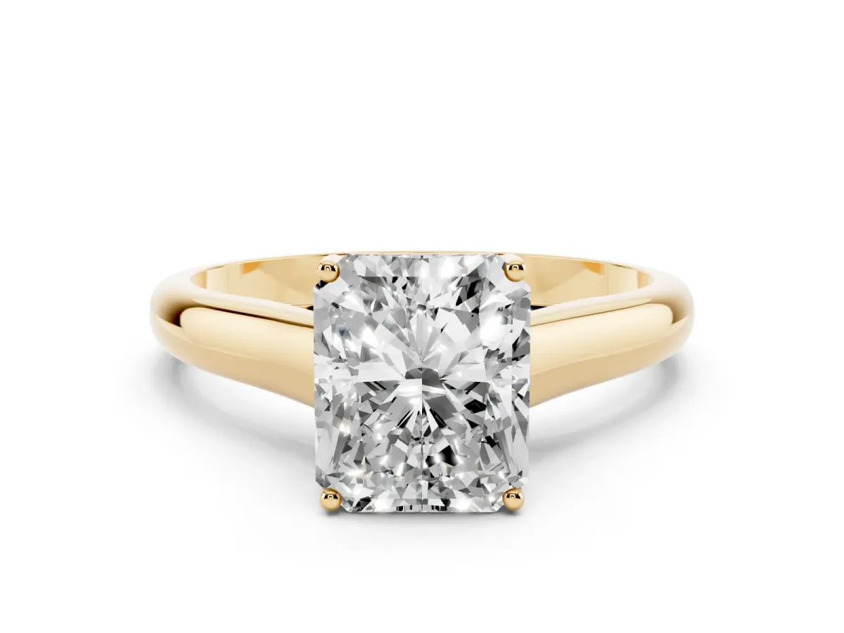 Radiant Cut Solitaire Engagement Ring with Tapered Band and Four-Prong Setting Yellow gold