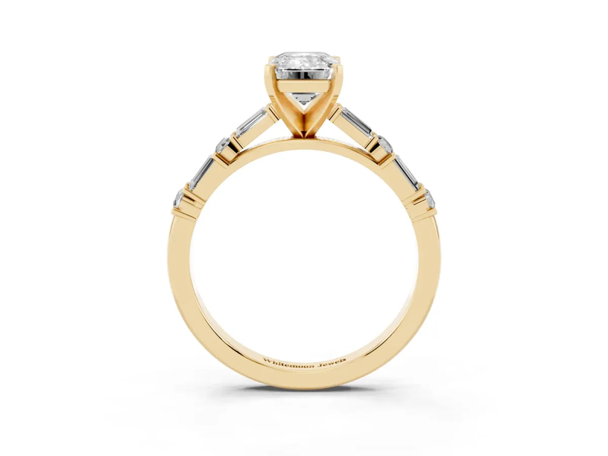 Emerald Cut Diamond Solitaire with Side Baguettes and Channel Set Band Yellow gold