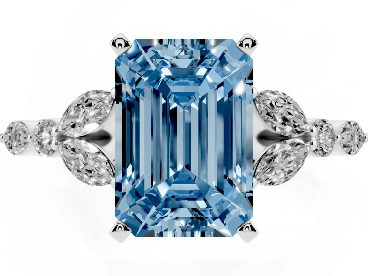 Fancy Blue Emerald Cut Diamond Solitaire Ring with Side Stones and Four-Prong Setting Platinum