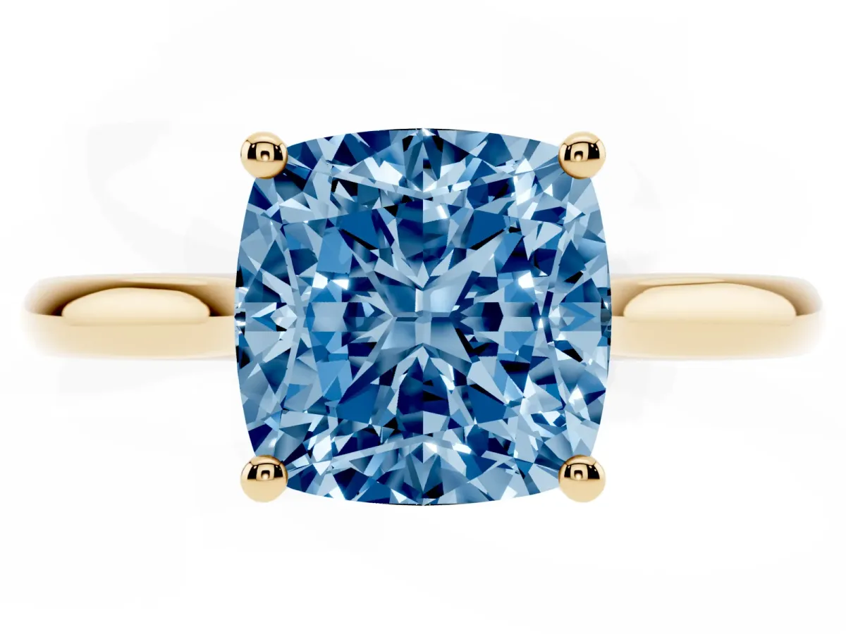 Fancy Blue Cushion Cut Cut Solitaire Ring with Cathedral Band and Four-Prong Setting Yellow gold