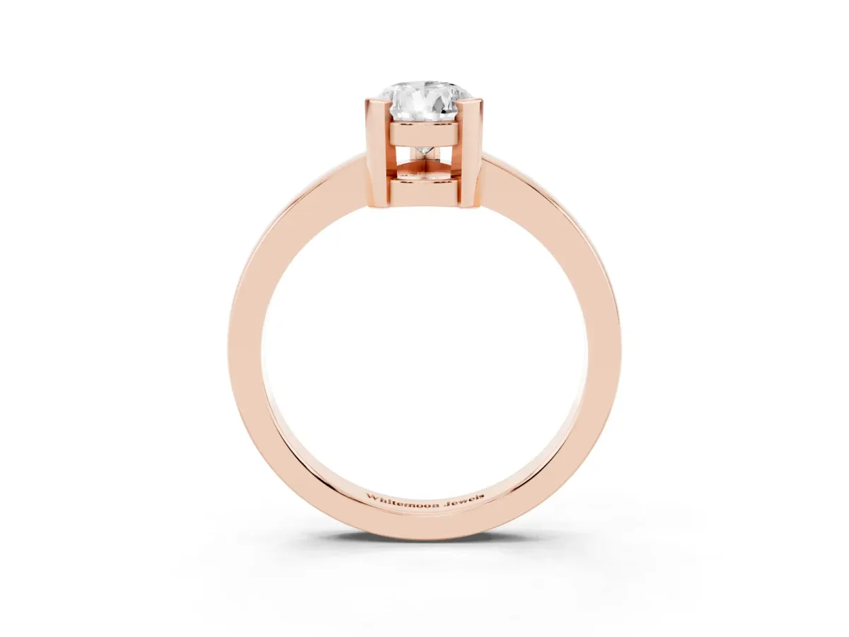 Pear Cut Cut Solitaire Ring with Four-Prong Setting and Classic Band Rose gold