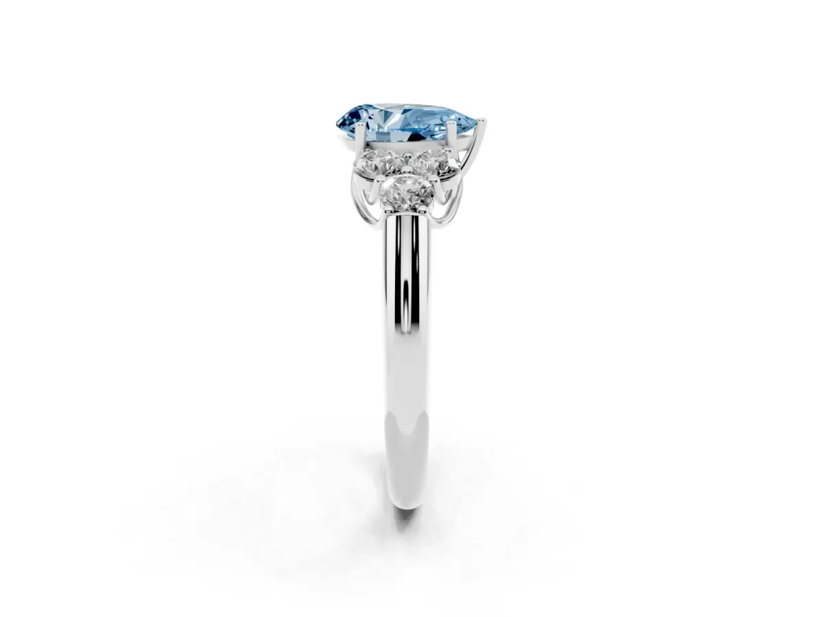 Fancy Blue Pear Cut Cut Diamond Cluster Ring with Round Accent Stones and Prong Setting on a Classic Band White gold
