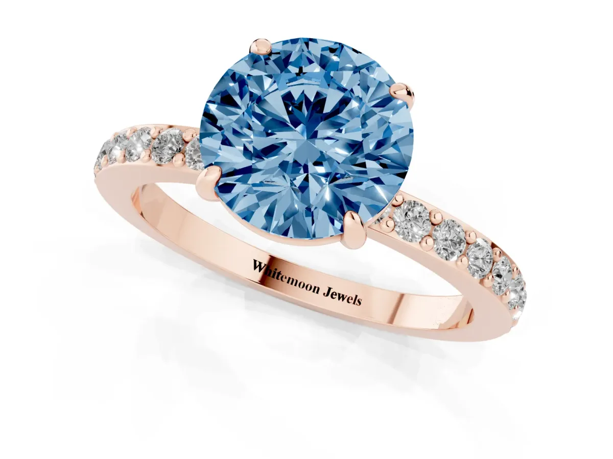Fancy Blue Round Cut Diamond Pavé Engagement Ring with Round Accents and Prong Setting Rose gold