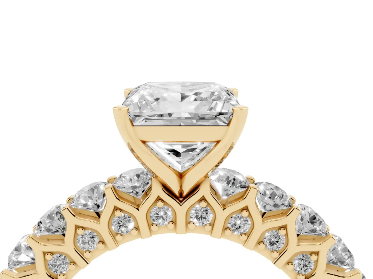 Princess Cut Diamond Solitaire Ring with Shared Prong Pavé Band and Four-Prong Setting Yellow gold