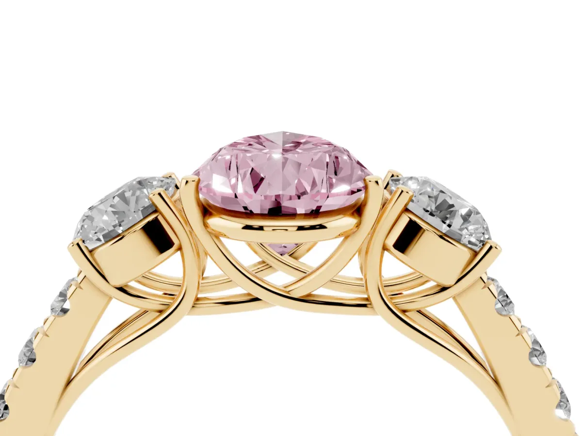 Fancy Pink Pear Cut Cut Diamond Three-Stone Ring with Round Side Stones and Pavé Band Yellow gold