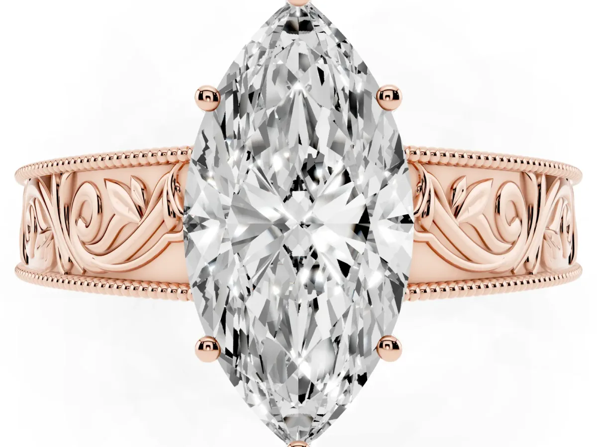 Marquise Cut Diamond Solitaire Ring with Engraved Band and Four-Prong Setting Rose gold